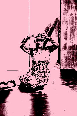 This image depicts a pink-haired person wearing a dress with a psychedelic pattern looking through a transparent balloon filled with water. Other balloons are strewn nearby on the floor, evoking the shape of breast implants.